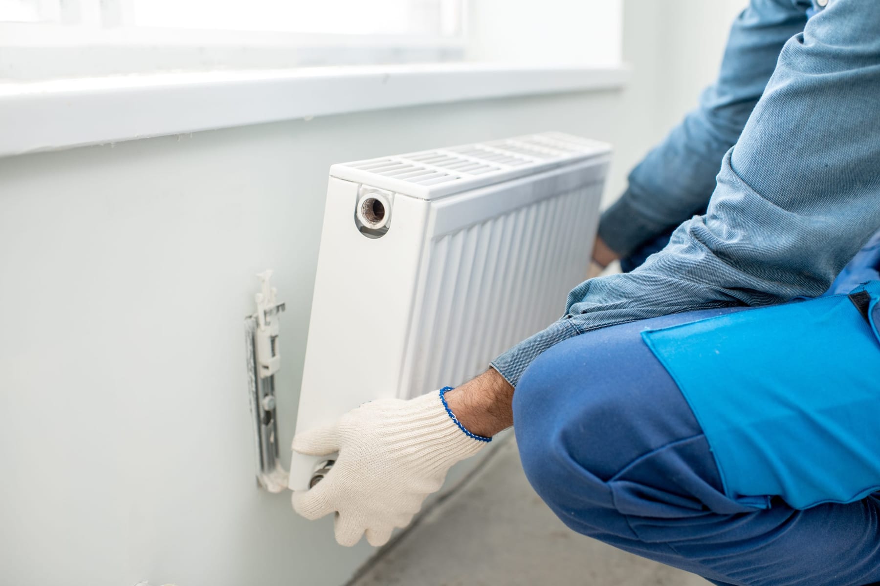 Technician at a heating appliance